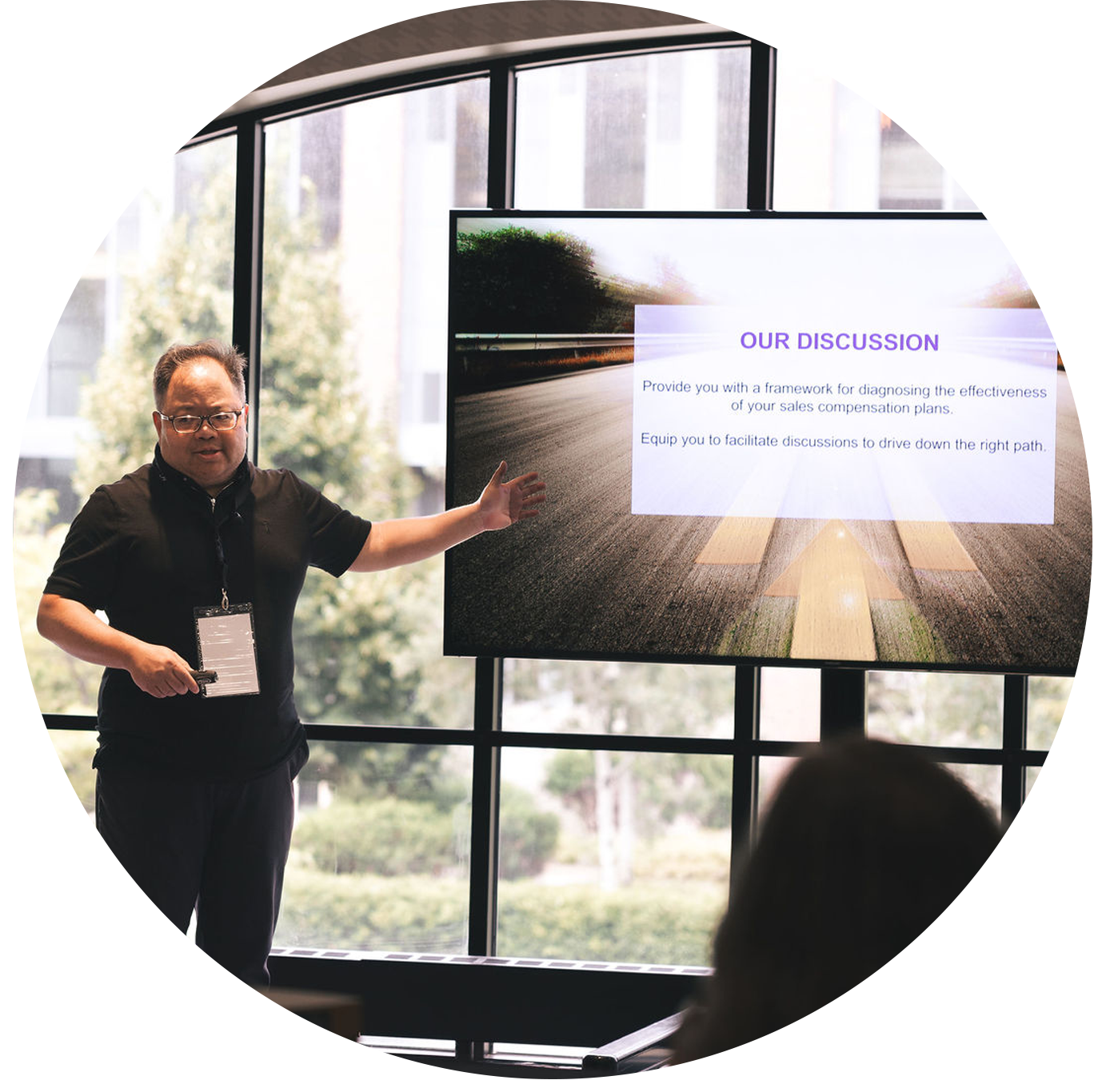 Man presenting at at Compensation Summit